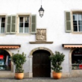 For the most part, shopfronts fit in comfortably with their older surroundings.